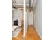 Spacious main bedroom with exposed ductwork, wood floors, and neutral decor at 87 Peachtree Sw St # 204, Atlanta, GA 30303