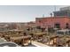 Tranquil rooftop garden featuring multiple elevated garden beds, city views, and building equipment at 87 Peachtree Sw St # 204, Atlanta, GA 30303