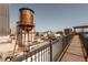 Rooftop with water tower with views of the city and access to a wooden deck area at 87 Peachtree Sw St # 204, Atlanta, GA 30303