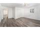 Spacious bedroom with fresh paint, vinyl floors, closet, light fixture, and window at 1496 Greenwillow Dr, Conley, GA 30288