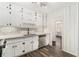 Updated kitchen with stainless steel appliances, white cabinets, and granite countertops at 1496 Greenwillow Dr, Conley, GA 30288