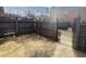 Large backyard with gate and wooden fence at 235 Winding River Dr # B, Atlanta, GA 30350