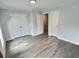 Bedroom with neutral color palette, featuring modern flooring and a bright and airy feel at 235 Winding River Dr # B, Atlanta, GA 30350