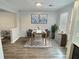Bright dining room with stylish table set and modern furniture at 235 Winding River Dr # B, Atlanta, GA 30350