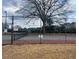 Community tennis court and field at 235 Winding River Dr # B, Atlanta, GA 30350