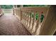 Exterior balcony with a brick floor and decorative concrete balusters at 2650 Riverfront Dr, Snellville, GA 30039