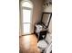 Bathroom with a granite-topped dark wood vanity and a decorative arched window at 2650 Riverfront Dr, Snellville, GA 30039