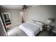 Bedroom features neutral carpet and an ensuite bathroom at 2650 Riverfront Dr, Snellville, GA 30039