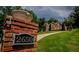 Beautiful property featuring a brick mailbox with the house number visible and a glimpse of the home at 2650 Riverfront Dr, Snellville, GA 30039