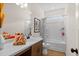 Well-lit bathroom featuring a vanity with countertop space and a shower-tub combination at 523 Lanier Way, Temple, GA 30179
