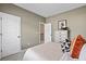 Comfortable bedroom featuring neutral tones, a cozy bed, and a convenient closet for easy organization at 523 Lanier Way, Temple, GA 30179