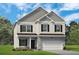 Charming two-story home with stone accents, black shutters, and well-manicured lawn at 523 Lanier Way, Temple, GA 30179