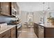 Bright kitchen featuring stainless steel appliances, a center island and hardwood floors at 523 Lanier Way, Temple, GA 30179