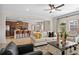 Spacious living area with open floor plan, connecting the kitchen and dining areas at 523 Lanier Way, Temple, GA 30179
