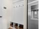 Mud room with bench seating, coat hooks and storage cubbies at 523 Lanier Way, Temple, GA 30179