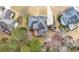 Bird's-eye view of an expansive home with a beautiful backyard and lush green surroundings at 925 Sentry Ridge Xing, Suwanee, GA 30024