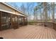 Expansive back deck with a screened-in porch, providing ample space for outdoor entertaining and relaxation at 925 Sentry Ridge Xing, Suwanee, GA 30024
