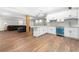 Basement kitchen with stainless steel appliances, white cabinetry, and an open concept design at 925 Sentry Ridge Xing, Suwanee, GA 30024
