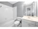Upstairs bathroom with a shower-tub combination, a toilet and vanity at 925 Sentry Ridge Xing, Suwanee, GA 30024