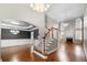 Elegant foyer with high ceilings, a grand staircase, and gleaming hardwood floors at 925 Sentry Ridge Xing, Suwanee, GA 30024
