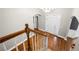 Entryway boasts wood floors, white trim, and a chandelier for a grand welcome at 925 Sentry Ridge Xing, Suwanee, GA 30024
