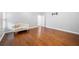 Bright living room with hardwood floors, neutral decor, and natural light creating a cozy and inviting atmosphere at 925 Sentry Ridge Xing, Suwanee, GA 30024
