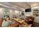 Inviting living room with plush seating, custom built-ins, and ample natural light for a comfortable ambiance at 1466 University Dr, Atlanta, GA 30306