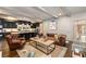 Open concept living room features hardwood floors and a seamless flow into the adjacent kitchen and dining area at 1466 University Dr, Atlanta, GA 30306