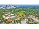Aerial view showcasing a green space, athletic field, and the Atlanta skyline at 795 Ponce De Leon Ne Pl # C3, Atlanta, GA 30306
