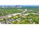 Aerial view overlooking lush greenery and neighborhood with Atlanta skyline on the horizon at 795 Ponce De Leon Ne Pl # C3, Atlanta, GA 30306