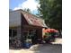 Exterior view of Dancing Goat Coffee Bar, highlighting the outdoor seating and welcoming atmosphere at 795 Ponce De Leon Ne Pl # C3, Atlanta, GA 30306