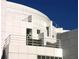 Architectural detail of the High Museum of Art exterior, showcasing its white façade and geometric design at 795 Ponce De Leon Ne Pl # C3, Atlanta, GA 30306
