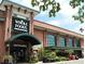 Exterior of Whole Foods Market, showcasing its brick facade, large windows, and convenient entrance at 795 Ponce De Leon Ne Pl # C3, Atlanta, GA 30306
