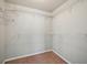 Walk-in closet featuring metal racks for plenty of storage space at 2726 Pierce Brennen Ct, Lawrenceville, GA 30043