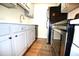 Efficient kitchen layout featuring modern appliances and cabinetry at 32 Peachtree Nw St # 202, Atlanta, GA 30303
