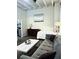 Contemporary living area featuring a sofa, modern decor, and wood floors at 32 Peachtree Nw St # 202, Atlanta, GA 30303