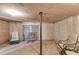 Unfinished basement area with chairs, wire storage, and concrete floor at 385 Grimes Bridge Rd, Roswell, GA 30075