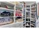 Walk-in closet features custom shelving and drawers to maximize storage and organization for shoes, bags, and clothing at 385 Grimes Bridge Rd, Roswell, GA 30075