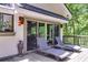 Outdoor deck with sliding glass doors and chaise lounge chairs perfect for relaxing at 385 Grimes Bridge Rd, Roswell, GA 30075
