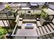 Multi-tiered deck with built in seating, fire pit, outdoor kitchen and garden boxes at 385 Grimes Bridge Rd, Roswell, GA 30075