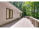 Spacious deck offering serene views and ample space for relaxation and entertainment at 385 Grimes Bridge Rd, Roswell, GA 30075