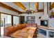 Eat in dining area with wooden beams, art, and built in booth style seating at 385 Grimes Bridge Rd, Roswell, GA 30075