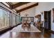 Charming dining room featuring vaulted ceilings, wood beams, and lots of natural light at 385 Grimes Bridge Rd, Roswell, GA 30075