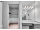 Dressing room featuring closet storage and a makeup vanity at 385 Grimes Bridge Rd, Roswell, GA 30075