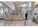 Bright dressing room featuring expansive mirrors, lots of vanity space, and natural light at 385 Grimes Bridge Rd, Roswell, GA 30075