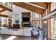 Inviting living room with a decorative fireplace, large windows, and hardwood floors offering style and comfort at 385 Grimes Bridge Rd, Roswell, GA 30075