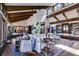 Spacious living room featuring high ceilings, wood accents, and seamless flow to dining area, creating a comfortable atmosphere at 385 Grimes Bridge Rd, Roswell, GA 30075
