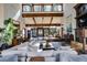 Bright and spacious living room with high ceilings, wood beams, and seamless flow, creating an inviting atmosphere at 385 Grimes Bridge Rd, Roswell, GA 30075