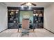 Stylish office with built-in bookshelves, a large desk, and comfortable seating for a productive workspace at 385 Grimes Bridge Rd, Roswell, GA 30075