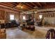 Unfinished basement offers potential for customization and extra storage space with exposed ceiling at 5050 Brownwood Dr, Powder Springs, GA 30127